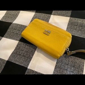 Adorable Coach wristlet in Yellow